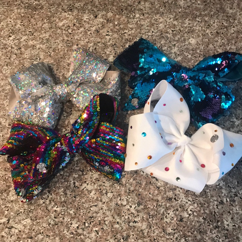 4 JO-JO bows... 3 are NWOT...silver worn once